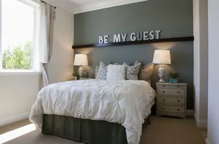 Interior of contemporary staged bedroom for guest